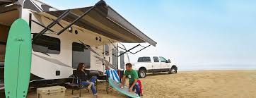 This car and trailer awning provided a nice shaded area outside to cook, eat and hangout. Rv Awnings Patio Awnings More Carefree Of Colorado