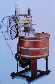 The washing machine cleaned by rubbing clothes between two ribbed surfaces. 1920s Electric Washing Machine Photo Homemadetools Net