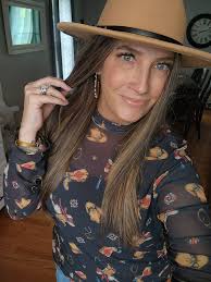 What earring goes best with this shirt? Pearl hoops or suede fringe?