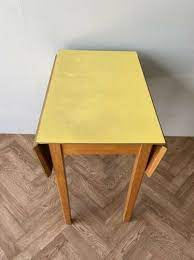Vintage retro blue formica kitchen table drop leaf with drawer mid century. Vintage Retro Yellow Formica Drop Leaf Space Saving Dining Kitchen Table Free Delivery Granny On A Camel