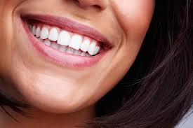 How a Cosmetic Dentist 'Puts in Teeth' to Enhance Your Appearance | Harmony  Dentistry