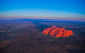 Uluru/ayers rock, giant monolith, one of the tors (isolated masses of weathered rock) in southwestern northern territory, central australia. People Are Still Flocking To Climb Uluru Despite Upcoming Ban Travel Leisure