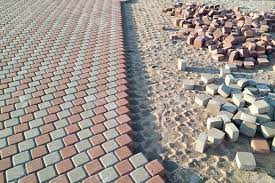 Picture of a paved street, selective focus. Red And White Paving Stones And Paving Slabs Are Laid In Even Stock Photo Picture And Royalty Free Image Image 154272290