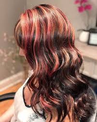 Dark brown hair with red highlights is often a better alternative than traditional blonde for naturally dark haired people or darker and warmer skin tones. 55 Incredible Red Hair With Blonde Highlights 2020 Trends