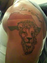 Download clker's african continent clip art and related images now. Upper Arm African Flag And Lion Tattoo Tattoobite Com Arm Tattoos For Guys African Tattoo Tattoo Designs Men