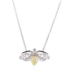 Maybe you would like to learn more about one of these? Tiffany Platinum 18k Yellow Gold Diamond Fancy Yellow Diamond Paper Flowers Firefly Pendant Necklace 481327 Fashionphile