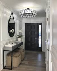 Architectural simplicity for the entryway, living room or dining room. My Foyer Is Finally Finished It Took A Long Time To Find The Perfect Chandelier F Chandelier In Living Room Foyer Lighting Low Ceiling Foyer Lighting Fixtures