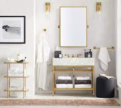 A playful blue and white mosaic tile will really make your bathroom shine. Black Handcrafted Marble Bathroom Accessories Pottery Barn