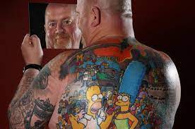 Heritage tattoo studio has a clean & friendly atmosphere and an experienced &. This Guy Has A Huge Tattoo With Over 200 Simpsons Characters On His Back