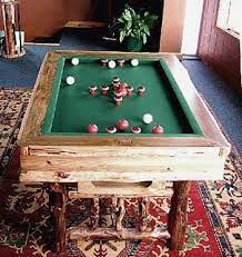 4 1/2 by 2 1/2 piece of woodmany pieces of wood that can be cut to be used as borders, supports underneath the table, and an outline on the outside of the table.saw to cut woodnail gunwool and polyester felt2 bike tireswood. Bumper Pool Table Bumper Pool Table Bumper Pool Pool Table