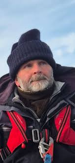 Car parked in a boat slip at marina