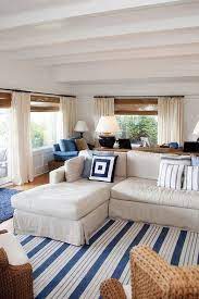 13 Gorgeous Decor Ideas For Your Thoroughly Non Tacky Beach House Beach House Interior Coastal Family Rooms Coastal Living Rooms