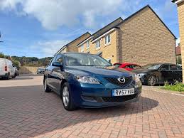 Image result for Electric Blue 2007 Mazda3
