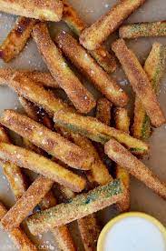 Spray your cooling rack with nonstick cooking oil pop your zucchini fries on your cooling rack in your baking tray and drizzle your zucchini fries. Crispy Baked Zucchini Fries Just A Taste