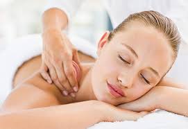 Friendly Beautician Providing a Range of Treatments