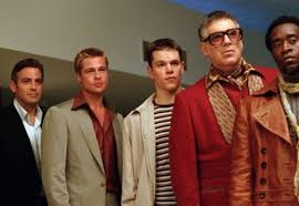 In momentul in care incearca sa plece, apar doua masini de politie. 5 Filme Memorabile Despre Jafuri Celebre