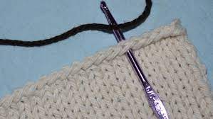 Follow the instructions and create a beautiful blanket! How To Crochet A Border Around Any Knitting Project
