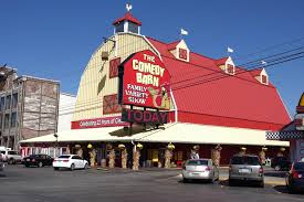 Live music venue in pigeon forge, tennessee. Pigeon Forge Attractions Comedy Barn Theater Bear Camp Cabin Rentals