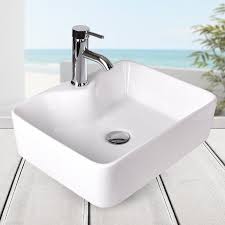 Its deep, generously sized basin helps minimize splashing, and the glass surface cleans up easily. Above Counter Ceramic Rectangular Vessel Bathroom Sink With Faucet Sink Ceramic Vessel Vessel Sink