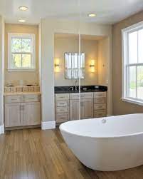 90 Primary Bathrooms With Hardwood Flooring Photos Hardwood Floors In Bathroom Wood Floor Bathroom Bathroom Flooring