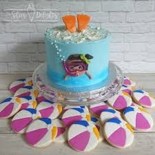 There are a few elements to this olympic swimming pool cake but dive in and give it a go! Cakes Sheer Delights Bakery
