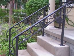 Outdoor stair railings and indoor stair railings generally have the same purpose in that they both assist in providing safer conditions for individuals wrought iron railings are typically associated with elegance. Curving Wrought Iron Hand Rails Open Up The Entrance Giving It A More Spacious Look Description From Pint Railings Outdoor Exterior Stairs Metal Stair Railing