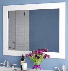 The bathroom sink and tub are custom designs, and the fittings are antique. Cheap Bathroom Mirror Ideas Design Morsels