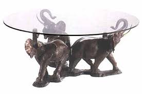 Glass Coffee Table Is Commonplace Coffee Tables For Homes Elephant Home Decor Elephant Decor Glass Elephants