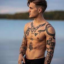 Small tattoos for guys on the lower side of the chest, one inch from mamma and on the left side a drawing that shows a simple representation of an elephant. Dan On Instagram Another Shirtless Pic What Are The Odds Image May Contain One Or M Chest Tattoo Men Small Chest Tattoos Back Tattoos For Guys Upper