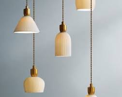 Etsy is home to countless handmade pendants, like this walmhomie design. Ceramic Pendant Light Etsy