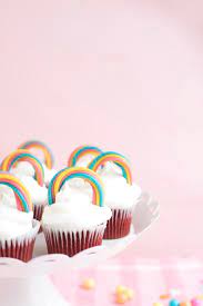 Make a paper rainbow cupcake topper for the rainbow cupcakes: Twizzler Rainbow Cupcake Toppers Diy