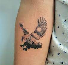 12 Small Eagle Tattoo Designs And Ideas Arm Tattoos For Guys Tattoos For Guys Small Eagle Tattoo