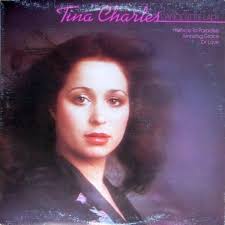Who wrote “Fallin' In Love (With A Boy Like You)” by Tina Charles?