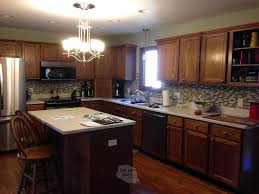 The short cut way to repaint kitchen cabinets with no sanding,stripping, or even removing the doors! How To Paint Kitchen Cabinets Our Best Tips Tricks The Diy Nuts