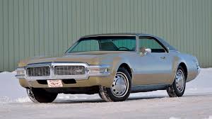 the oldsmobile toronado boasts jet age style and affordable prices hagerty media the oldsmobile toronado boasts jet age