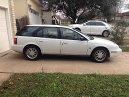 Image result for Bright Red 2000 Saturn