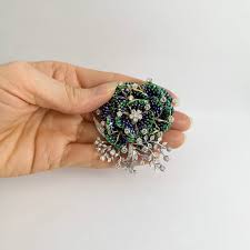 green brooch