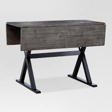 The table has a drop leaf on one side to add or remove table space when needed. Drop Leaf Pub Table Target