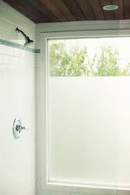 try inexpensive contact paper to add frosted windows window in shower bathroom windows bathroom window treatments