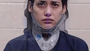 Man charged with choking mother