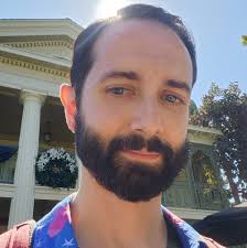 How many days in advance to book light saber building and droid depot  experiences at Disney World?