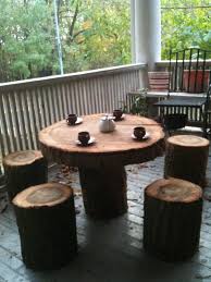 Mystery Patio Set Possibly Made From Fallen Tree Turns Up On Woodley Park Porch Garden Table And Chairs Tree Stump Table Diy Garden Table