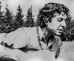 Photo of author playing guitar