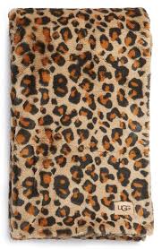 When styled incorrectly, rooms can easily look tacky and juvenile. Juno Cheetah Faux Fur Throw Blanket