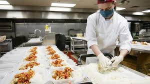 Santa Fe Community College Students Volunteers Prepare Meals For Those In Need Santa Fe New Mexican Food Preparation Community College Student Volunteer