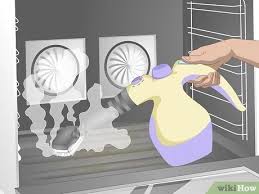 Pour 1 cup of water in the center of the oven floor. How To Steam Clean An Oven 10 Steps With Pictures Wikihow