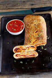 How To Make Stromboli Recipe For How To Make Homemade Stromboli Made With Pizza Dough Real Dough Homemade Stromboli Stromboli Recipe How To Make Stromboli