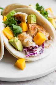 In a blender, blend the sour cream, milk, lime, garlic powder, salt, and pepper. Oven Baked Tilapia The Wooden Skillet