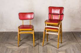 vintage red wooden dining chairs