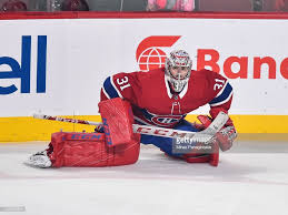 Carey price cap hit, salary, contracts, contract history, earnings, aav, free agent status. Goaltender Carey Price Of The Montreal Canadiens Stretches In The Montreal Canadiens Canadiens Hockey Goalie
